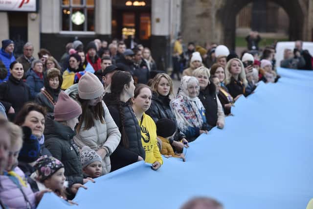 The vigil was preceded by a procession from Peterborough Town Hall to Cathedral Square with a 25m flag.