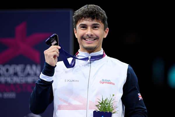 Jake Jarman with a gold medal from the 2022 European Championships. Photo by Matthias Hangst/Getty Images.