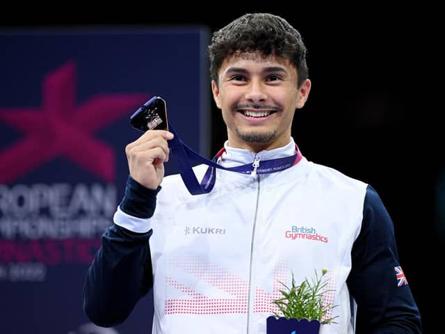 Jake Jarman with a gold medal from the 2022 European Championships. Photo by Matthias Hangst/Getty Images.