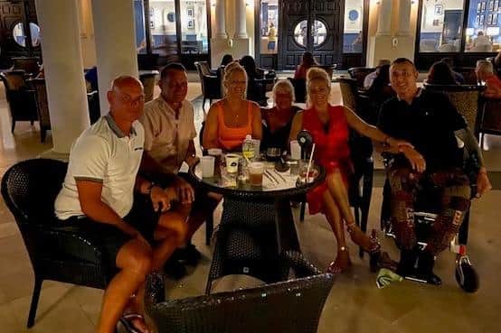David Samuels, (r) with wife Danielle, and Melanie Dobbs, along with friends on holiday