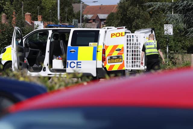 Police van on the scene at Wellington Street car park on Tuesday morning. Photo: Paul Marriott.
