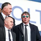 Posh co-owner Dr Jason Neale (right)  in the stands at Bolton Wanderers last weekend with interim CEO Leighton Mitchell (foreground). Photo: Joe Dent/theposh.com.