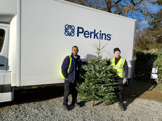 Volunteers from Perkins Engines Company Limited L to R Ozvaldo Azevedo and Nathan Law