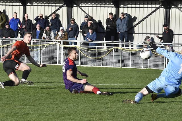 Dan Jarvis scores his first goal for Peterborough Sports v Rushall Olympic. Photo David Lowndes