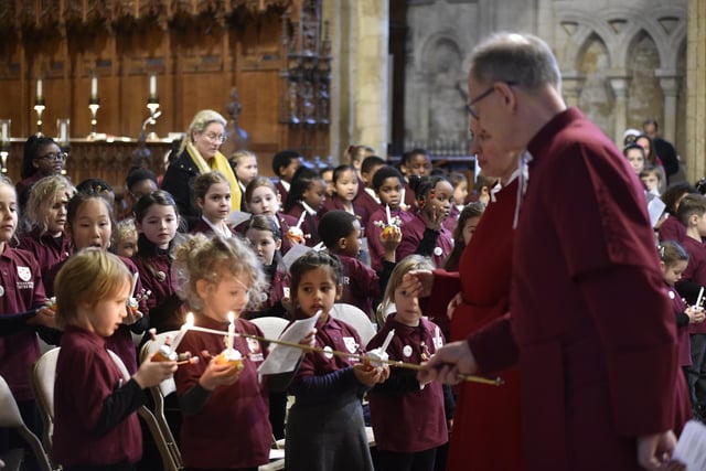 Children taking part in the Christingle service at Peterborough Cathedral