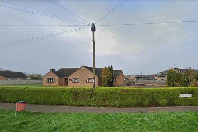 The development, if approved, will be located behind 12 Knights End Road in March (pictured)