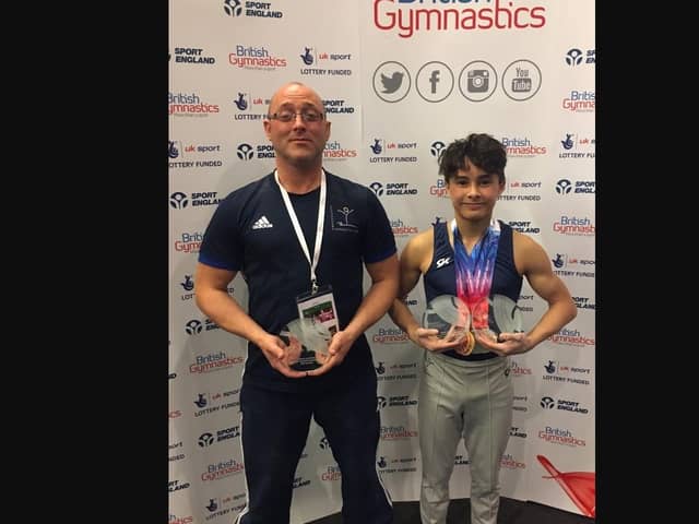 Jake and coach Ben Howells at the British Gymnastics Championships in 2017.