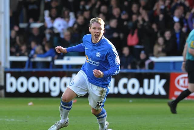 Grant McCann celebrates his goal for Posh against Sheffield Wednesday in April, 2013. Photo: Paul Franks.
