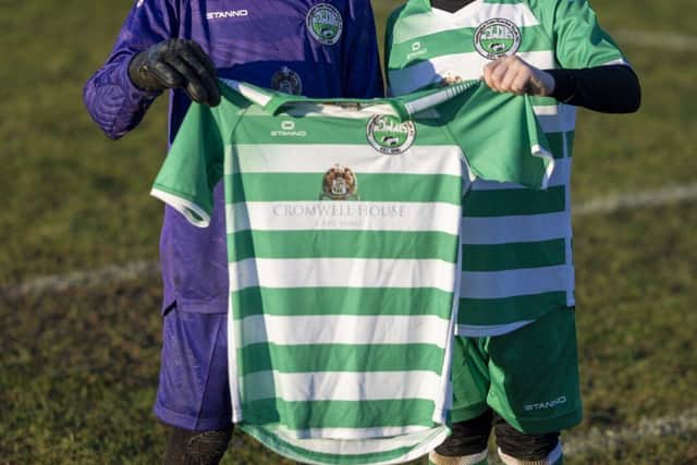 Huntingdon Town Rowdies Under 9’s Red with new kit sponsored by Cromwell House Care Home