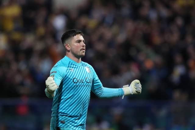 Former Posh goalkeeper Christy Pym celebrates victory over his old club earlier this season. Photo: Joe Dent/theposh.com.