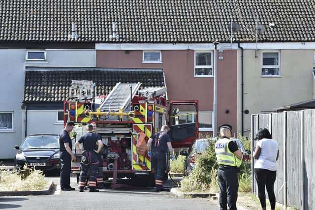 Emergency services at the scene of a house fire at Crabtree, Paston