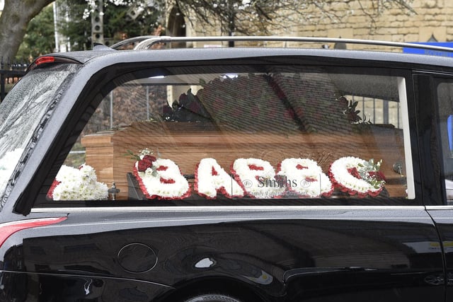 Flowers in memory of Carlo.