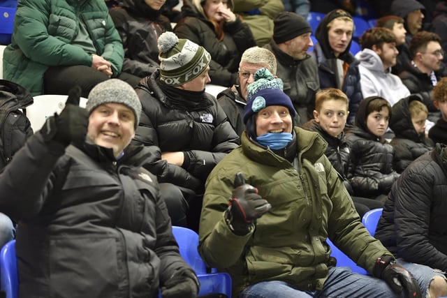 Peterborough United fans watch Tuesday night's win over Shrewsbury Town.