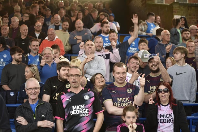 Peterborough United fans watch their play-off semi-final defeat at home to Oxford United.