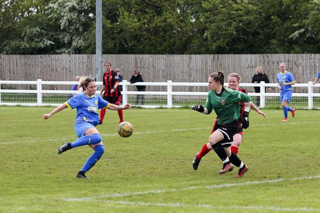 Katie Steward (left) in action for Peterborough Sports at Huntingdon. Photo: Tim Symonds.