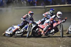 Heat 1 action involving Panthers riders Chris Harris (red helmet) and Hans Andersen (blue). Photo: David Lowndes.