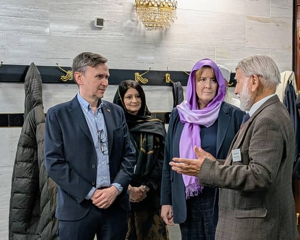 Peterborough MP Andrew Pakes talks to Police Minister Sarah Jones and Abdul Chaudhuri, chair of the Joint Mosque Council.