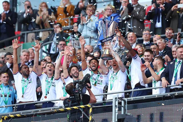 Bolton Wanderers celebrate their EFL Trophy Final success at Wembley last season. Photo by Tom Dulat/Getty Images.