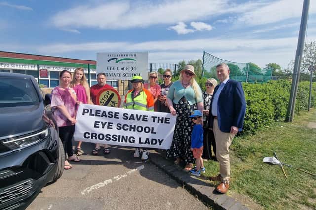 Campaigners rally in support of the Eye crossing lady.