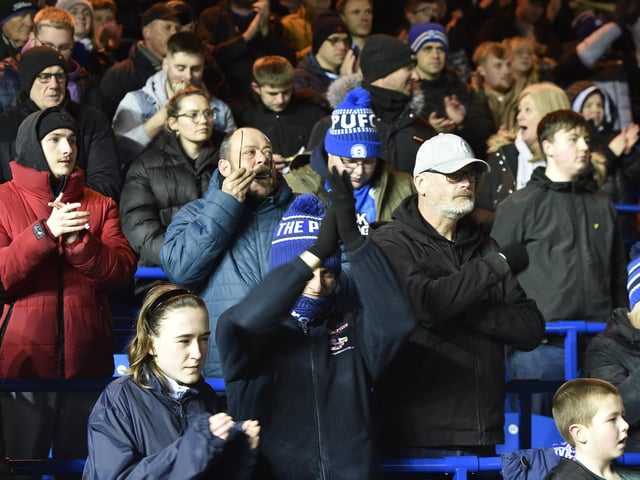 Peterborough United fans watch the 0-0 draw with Charlton Athletic.