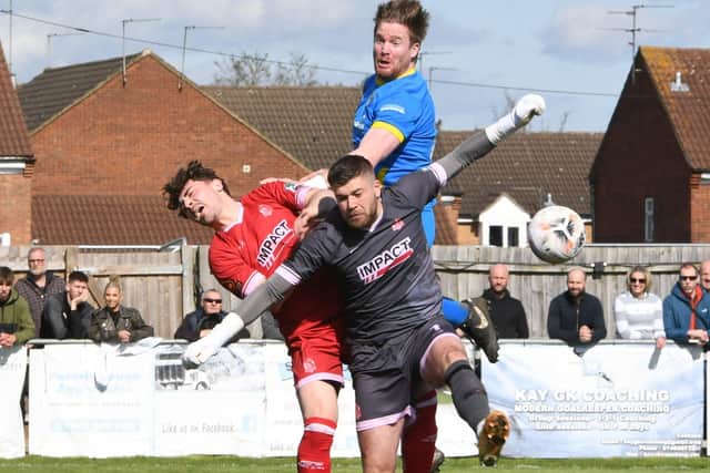 MIchael Gash (blue) in action for Peterborough Sports against Alfreton. Photo: David Lowndes.