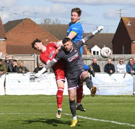 MIchael Gash (blue) in action for Peterborough Sports against Alfreton. Photo: David Lowndes.
