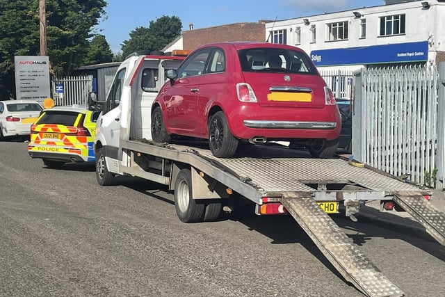 This red Fiat 500 was a stolen vehicle. The recovery vehicle it is on the back of also had false number plates. One male was arrested for several offences.