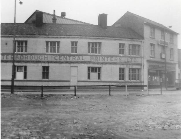 We are looking west from near Boots Square at the elevation of Central Printers at the twist in the road. Part demolition of the east side of the road has already taken place.