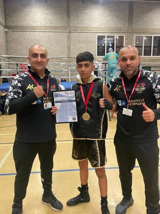 Aamir Shirazi (centre) after his NABC title success with coaches Akif Shirazi (left) and Bilal Javed.