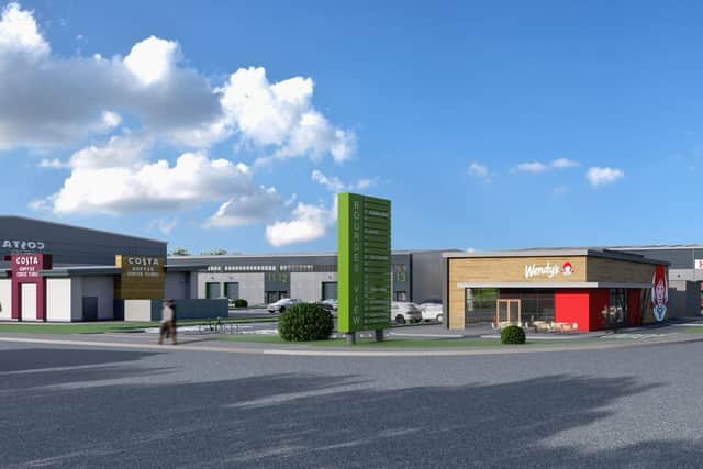 This image shows the entrance to Bourges View, off Maskew Avenue, in Peterborough, with the drive-thrus for Wendy's, Taco Bell and Costa Coffee