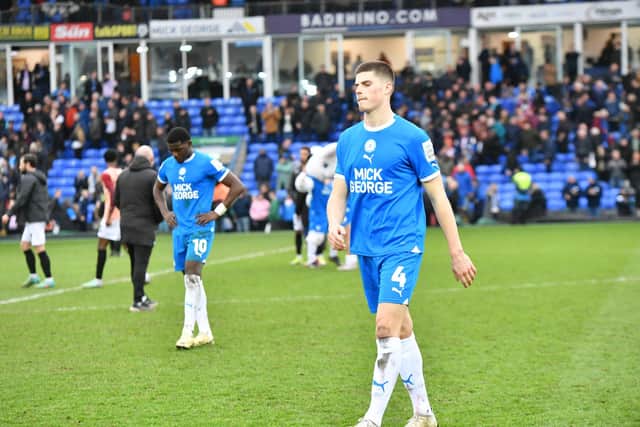 Posh star Ronnie Edwards is unhappy after defeat at home to Portsmouth. Photo David Lowndes