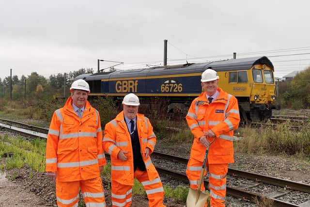 From left, chief executive of GBRailfreight John Smith, Peterborough City Council leader Councillor Wayne Fitzgerald, and Ian Bald at the ground breaking last November to start construction of the rail maintenance hub.