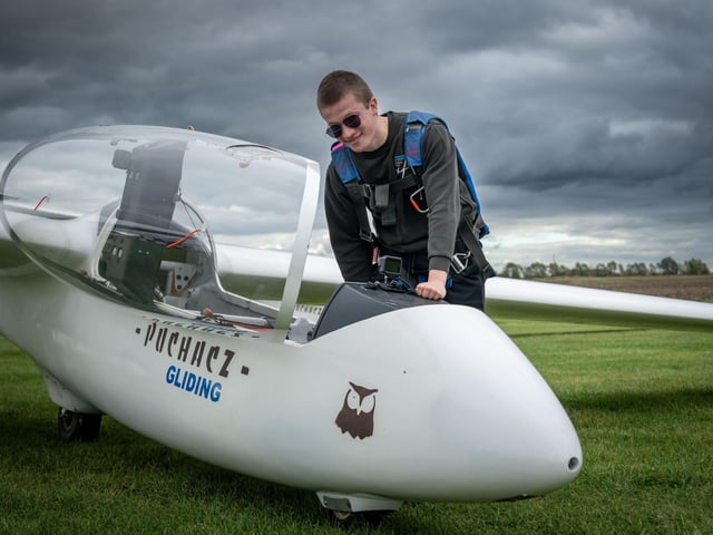 Charlie Lumb can now soar solo through the skies at speeds of 120mph in the unpowered aircraft despite not being old enough to drive a car.