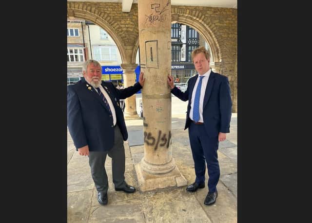 Cllr John Fox and MP Paul Bristow were left appalled by graffiti at the city's Guildhall.