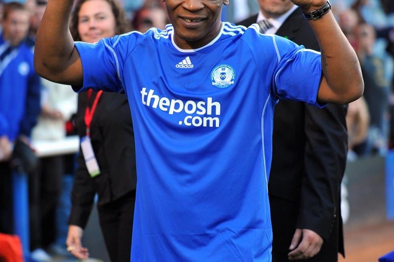 POSH v West Ham friendly - Mike Tyson poses in a Posh shirt