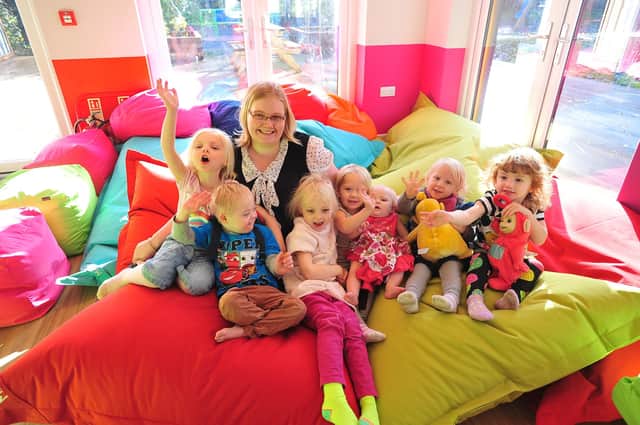 2013 - Inside the rebuilt Spinney Centre For children in Need  by DIY SOS  is Michelle King with children who are using the centre