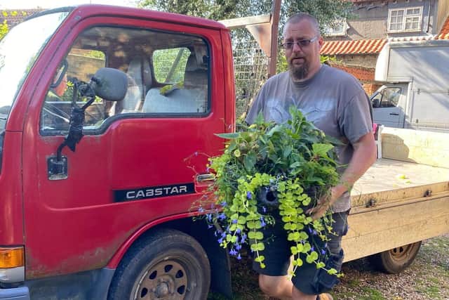 Members of Chatteris in Bloom were told by the council said they had to complete a safety course or hire a contractor to put their award-winning displays up. There were fears over electrocution from hanging the baskets on lampposts which meant the group, which have won gold at Britain in Bloom, were not able to put their own baskets up. Yesterday (June 4), the group were victorious as they found a way around the council's new rules and their flowers went up.