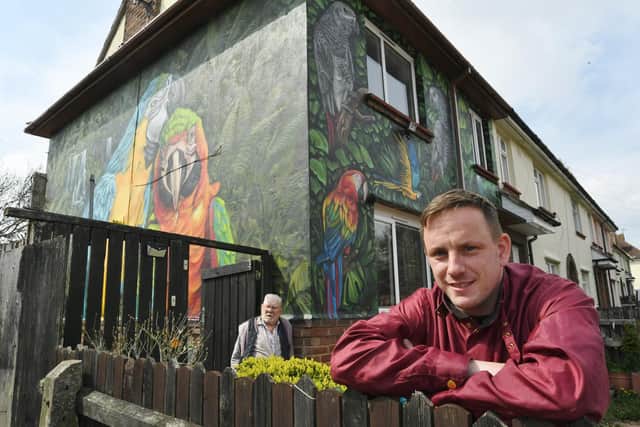 Home owner Gordon Squires with artist Nathan Murdoch in Flag Fen Road, after Nathan was commissioned to turn the exotic bird lover's home into a work of art back in April.