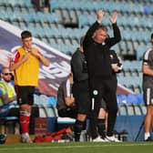 Peterborough United Manager Darren Ferguson claps the supporters after they show their support towards him. Photo: Joe Dent.