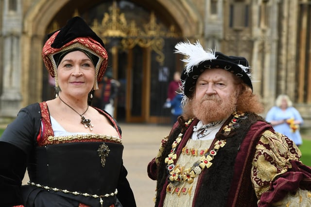 Henry VIII and Katharine of Aragon outside Peterborough Cathedral.