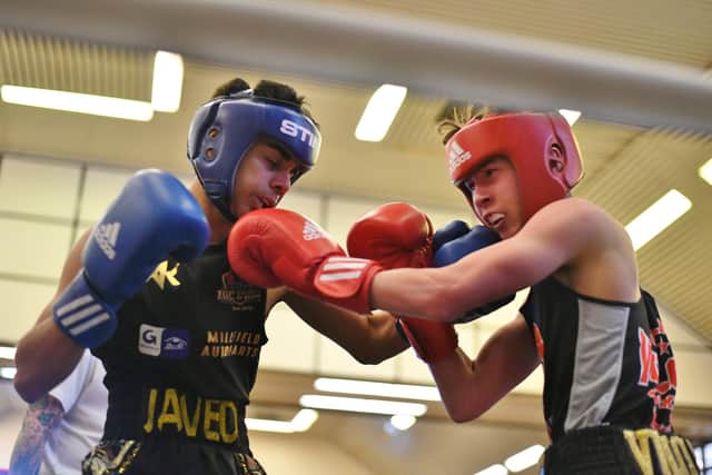 Boxing for Top Yard Boxing Club's Adam Javed (left) in action. Photo: David Lowndes.