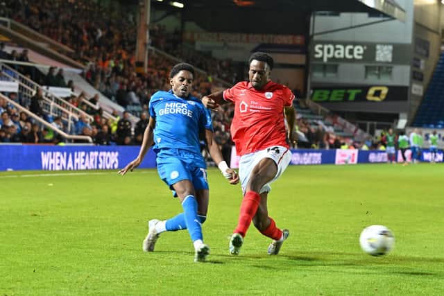 Kyrell Lisbie in action for Peterborough United against Barnsley. Photo: David Lowndes.