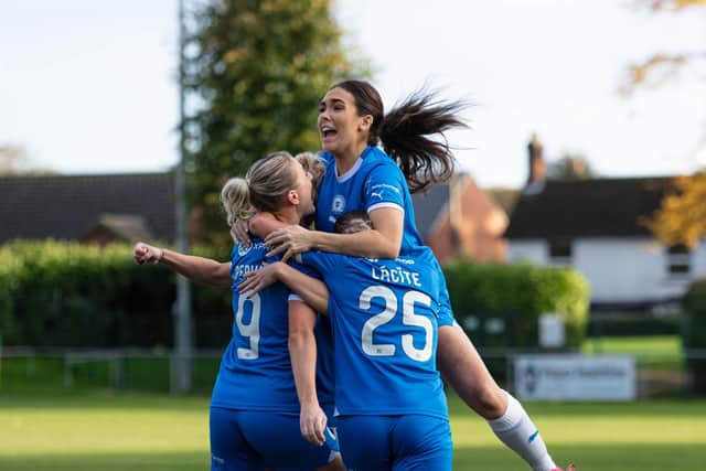 Posh celebrate their winning goal against Solihull Moors, Photo: Ruby Red Photography