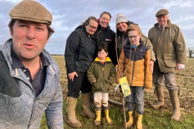 Farmer Tom Martin, front left, with some of the volunteers at one of the tree planting days.