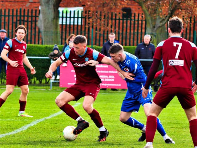 James Hill-Seekings (on ball) scored twice for Bourne Town against Dunkirk. Photo: Dave Mears.