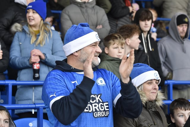 Peterborough United fans enjoy the impressive win over Oxford United on 9th December 2023.