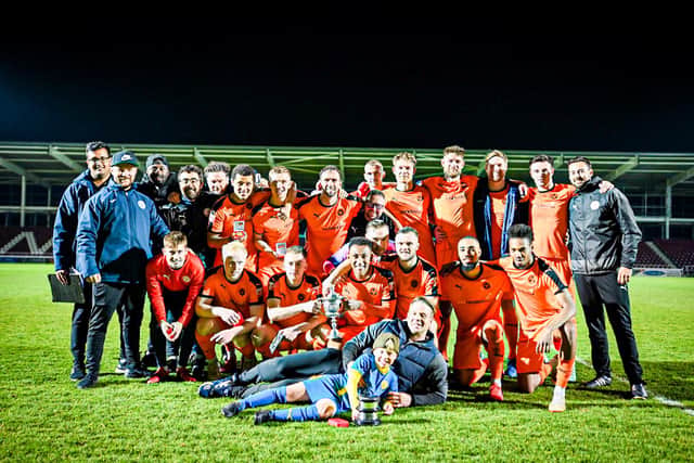 Peterborough Sports celebrate a Northants Cup success earlier this season. Photo: James Richardson.