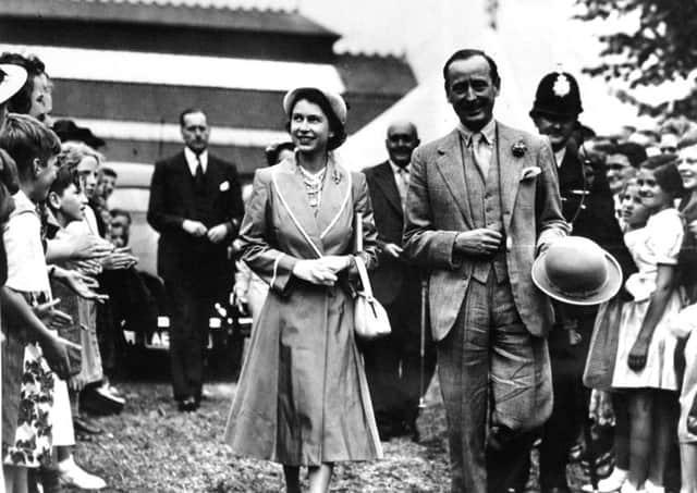 Princess Elizabeth being escorted around the East Of England Show by Lord De Ramsey, in 1951