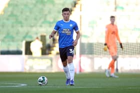 Charlie O'Connell in action for Peterborough United against Plymouth Argyle in the EFL Cup last season. Photo: Joe Dent.