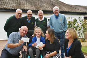 Tree Iron Society members Pete Waters, Patrick Garner, Rod Brailsford, Roy Chowings and John McCallum presents a cheque for £500 to Louise Evans, Lauren Smith and Ava Lucas (7) from Little Miracles.